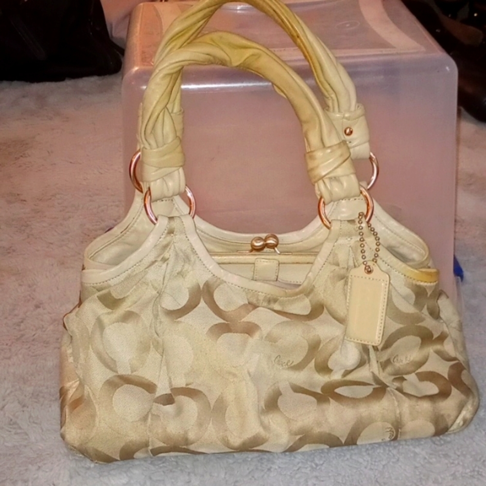 Coach purse gold with pink interior